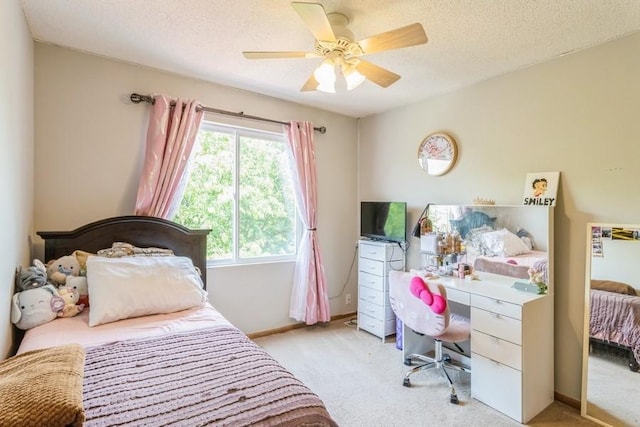 4965 Raintree Dr, West Des Moines, IA 50265 - bedroom featuring carpet, a textured ceiling, and a ceiling fan