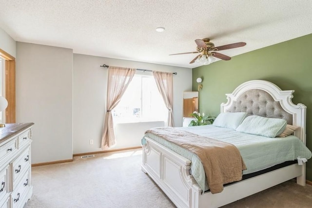 4965 Raintree Dr, West Des Moines, IA 50265 - bedroom with light carpet, a textured ceiling, and ceiling fan