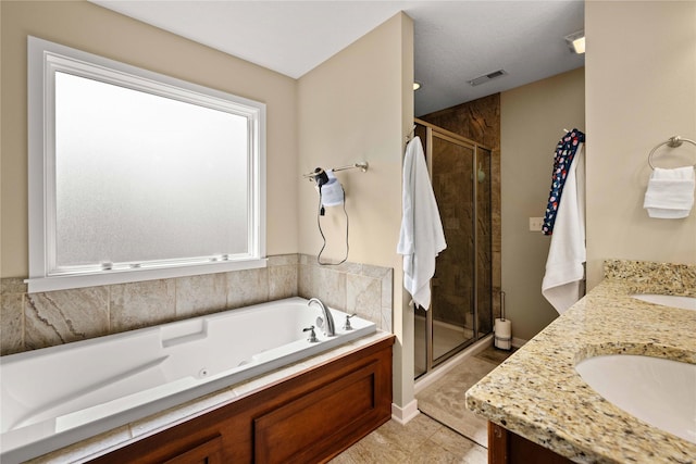 270 NE Prairie Wolf Dr, Waukee, IA 50263 - bathroom featuring a stall shower, a tub with jets, and double vanity