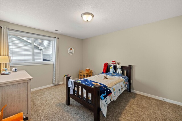 270 NE Prairie Wolf Dr, Waukee, IA 50263 - bedroom featuring light carpet and a textured ceiling