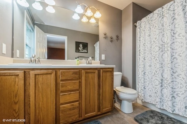 4528 NE Mcdougal Ln, Ankeny, IA 50021 - full bath with double vanity, tile patterned flooring, and curtained shower