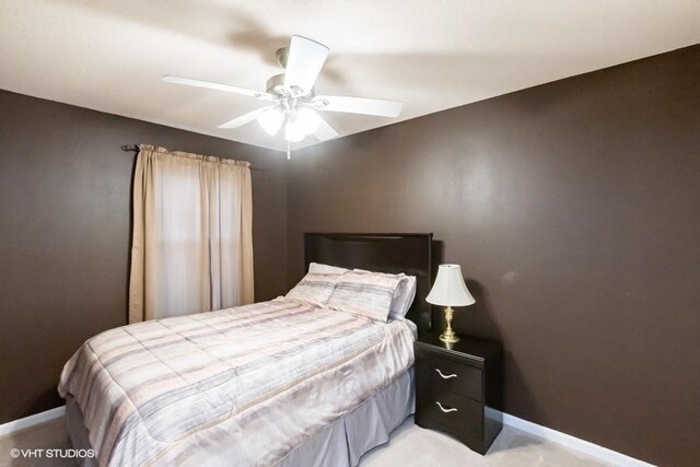4528 NE Mcdougal Ln, Ankeny, IA 50021 - bedroom with baseboards and ceiling fan