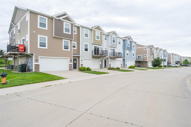 2714 NW Lois Ln, Ankeny, IA 50023 - view of concrete road with a residential view and sidewalks