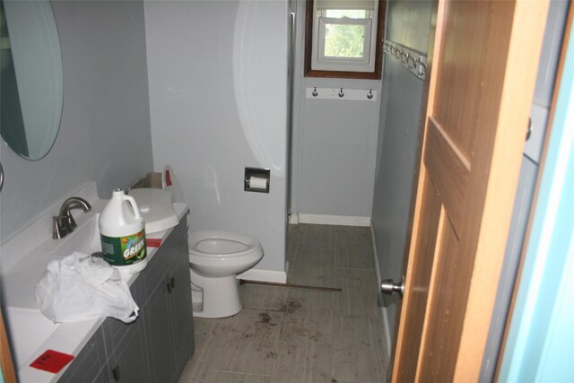 13018 137th Ave, Plano, IA 52581 - half bath featuring vanity and toilet
