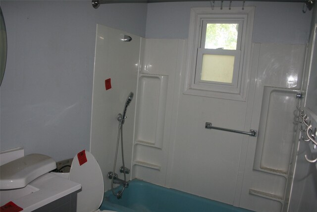 13018 137th Ave, Plano, IA 52581 - full bathroom featuring toilet and shower / washtub combination