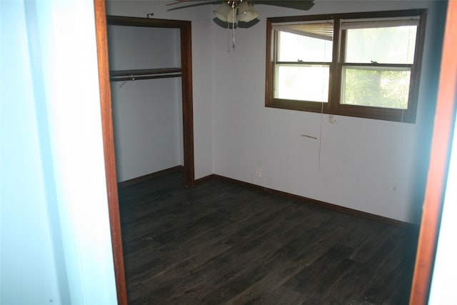 13018 137th Ave, Plano, IA 52581 - unfurnished bedroom featuring dark wood finished floors and a closet