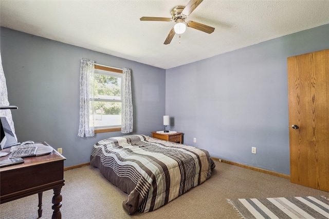 4935 NE 39th Ave, Des Moines, IA 50317 - carpeted bedroom featuring ceiling fan and a desk