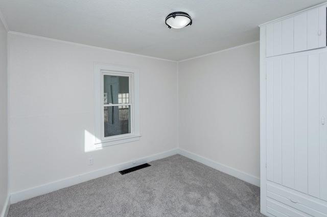 703 Maxwelton Dr, Des Moines, IA 50315 - carpeted empty room with crown molding and baseboards