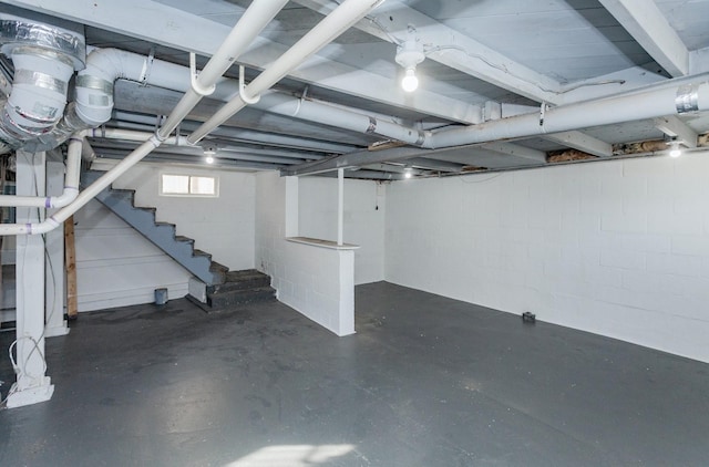703 Maxwelton Dr, Des Moines, IA 50315 - below grade area with stairs and concrete block wall