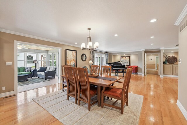 4416 Oakwood Ln, West Des Moines, IA 50265 - dining area featuring healthy amount of natural light, ornamental molding, light wood-style floors, recessed lighting, and decorative columns