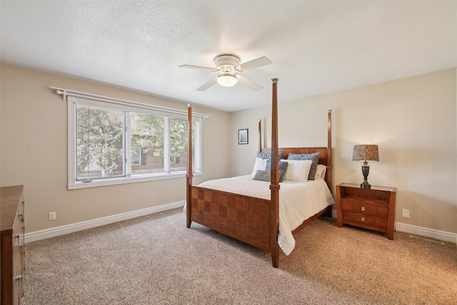 4416 Oakwood Ln, West Des Moines, IA 50265 - carpeted bedroom with a ceiling fan and a textured ceiling