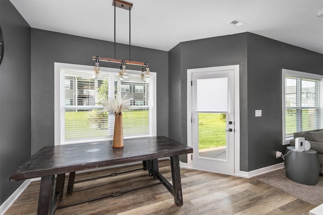 2817 NW Lois Ln, Ankeny, IA 50023 - dining space featuring light wood-type flooring and baseboards