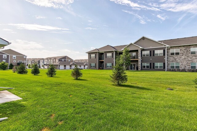 2817 NW Lois Ln, Ankeny, IA 50023 - view of green lawn with a residential view