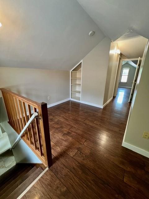 1506 Main St, Adel, IA 50003 - bonus room with lofted ceiling, built in features, and hardwood / wood-style flooring