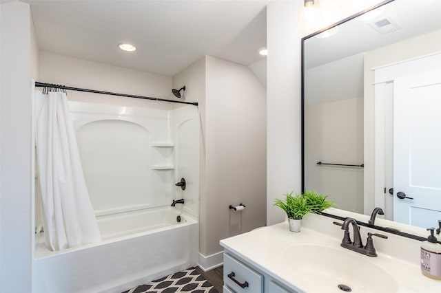 2930 Green Hills Dr, Ames, IA 50014 - full bath featuring vanity, shower / bath combo with shower curtain, wood finished floors, and recessed lighting