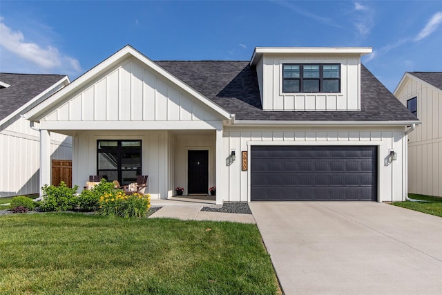 2930 Green Hills Dr, Ames, IA 50014 - modern farmhouse style home featuring board and batten siding, a front yard, and roof with shingles