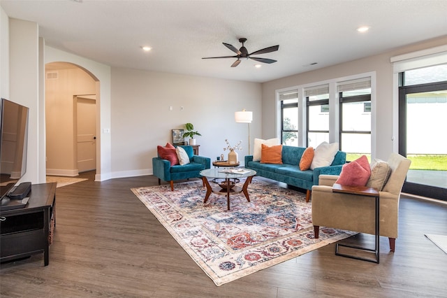 2930 Green Hills Dr, Ames, IA 50014 - living room with arched walkways, ceiling fan, wood finished floors, and recessed lighting