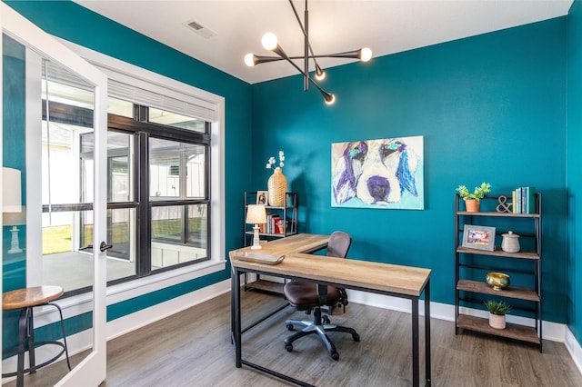 2930 Green Hills Dr, Ames, IA 50014 - office space with a chandelier and wood finished floors
