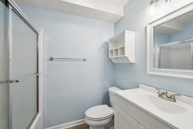 1069 Glen Oaks Dr, West Des Moines, IA 50266 - bathroom featuring toilet and vanity