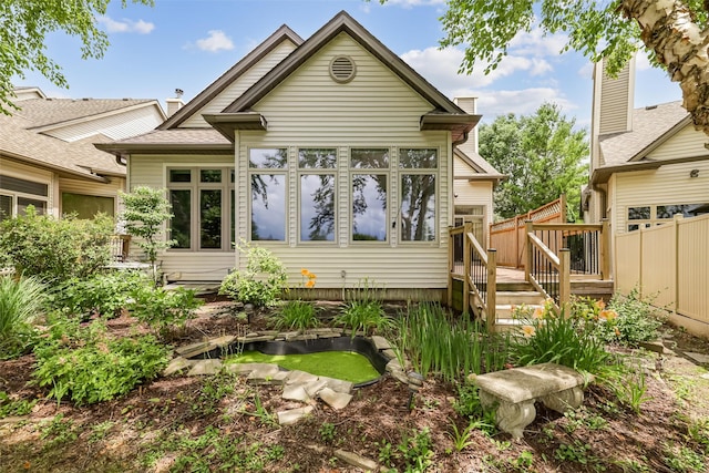 1069 Glen Oaks Dr, West Des Moines, IA 50266 - rear view of house with a wooden deck