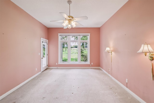 1069 Glen Oaks Dr, West Des Moines, IA 50266 - empty room with ceiling fan and light colored carpet