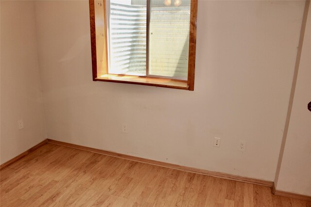 4015 Marigold Dr, Ames, IA 50014 - empty room with light wood-style flooring and baseboards