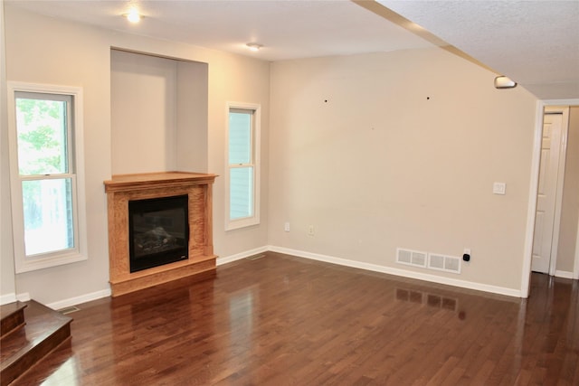4015 Marigold Dr, Ames, IA 50014 - unfurnished living room featuring a fireplace and wood finished floors