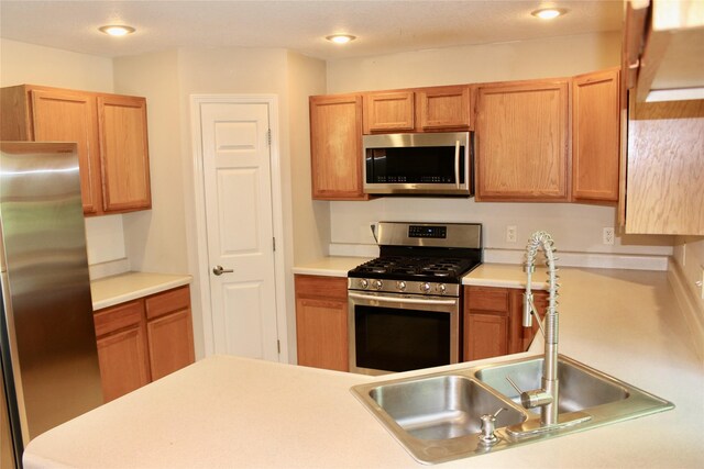 4015 Marigold Dr, Ames, IA 50014 - kitchen with appliances with stainless steel finishes, light countertops, and recessed lighting