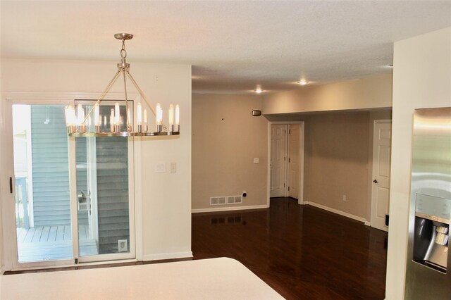 4015 Marigold Dr, Ames, IA 50014 - unfurnished dining area with a chandelier and wood finished floors