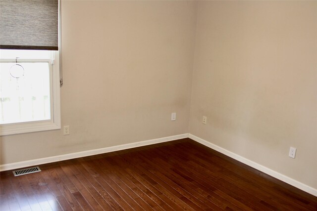 4015 Marigold Dr, Ames, IA 50014 - unfurnished room featuring dark wood-type flooring and baseboards