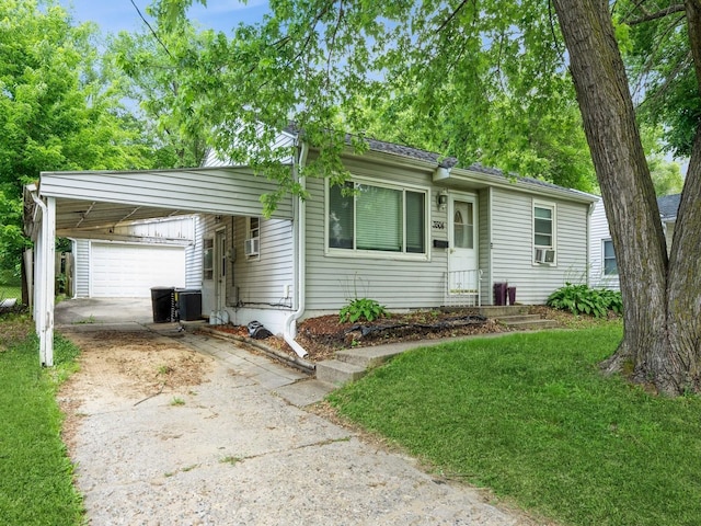 3504 27th St, Des Moines, IA 50310 - single story home with concrete driveway, a front lawn, a garage, and cooling unit