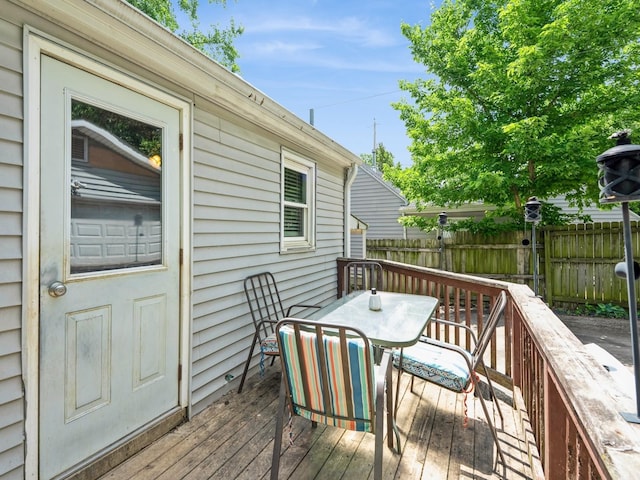 3504 27th St, Des Moines, IA 50310 - wooden deck featuring outdoor dining space