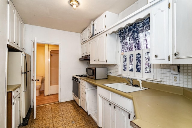 317 N Russell Ave, Ames, IA 50010 - kitchen featuring white appliances, tile patterned floors, white cabinets, and tasteful backsplash