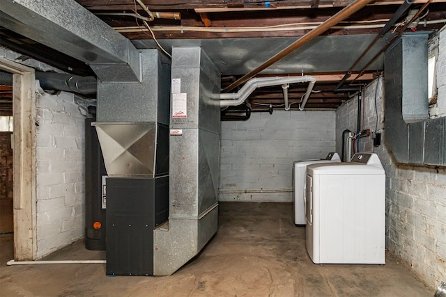 317 N Russell Ave, Ames, IA 50010 - unfinished below grade area with heating unit and separate washer and dryer