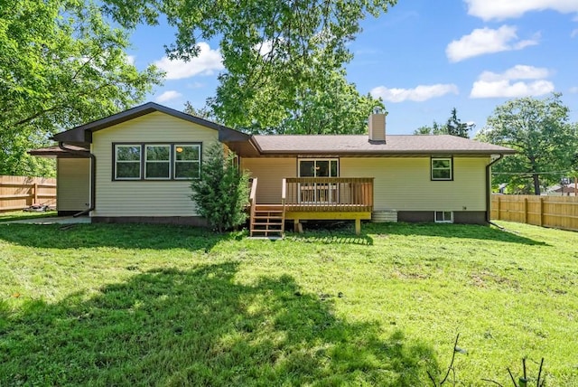1516 73rd St, Windsor Heights, IA 50324 - back of property featuring a wooden deck and a chimney