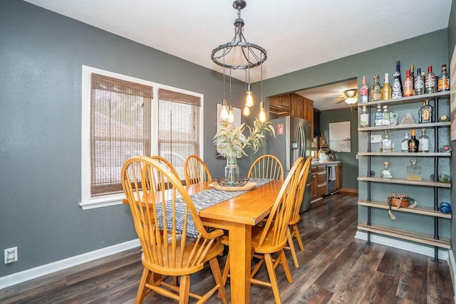 305 E 20th St S, Newton, IA 50208 - dining area with dark wood finished floors and ceiling fan