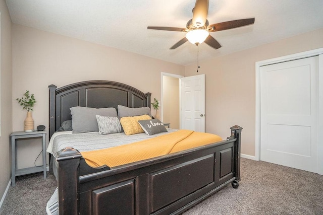 305 E 20th St S, Newton, IA 50208 - bedroom with carpet floors and ceiling fan