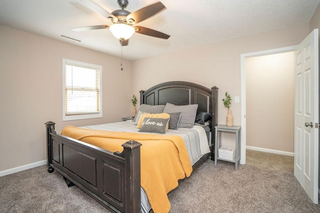 305 E 20th St S, Newton, IA 50208 - bedroom featuring light colored carpet and ceiling fan
