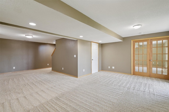 7039 Carey Ct, Johnston, IA 50131 - carpeted empty room with baseboards and recessed lighting