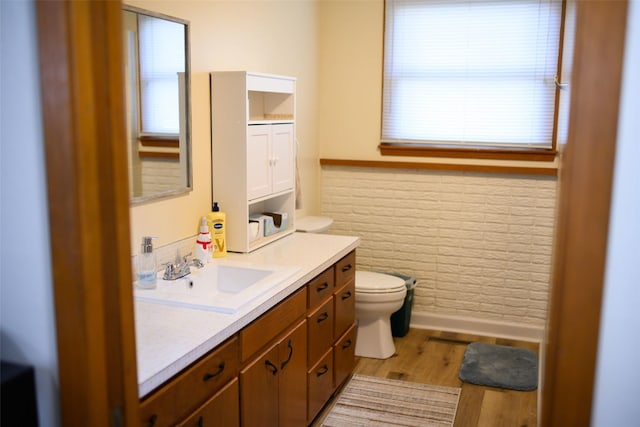 205 E 23rd St N, Newton, IA 50208 - bathroom featuring vanity and wood finished floors