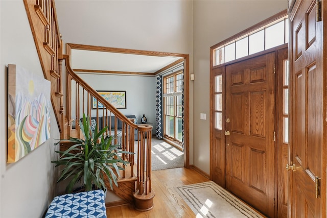 940 High Ave, Newton, IA 50208 - entryway featuring light wood-style floors and stairway