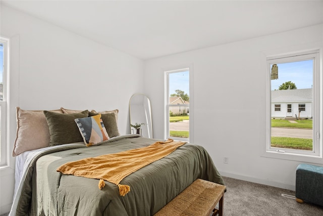 707 Bromley St, Marshalltown, IA 50158 - bedroom featuring carpet floors and baseboards