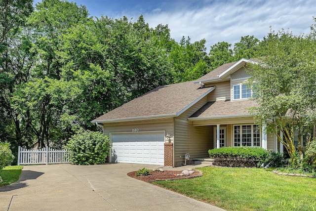 1560 Castlegar Ct, Pleasant Hill, IA 50327 - view of front facade featuring concrete driveway, a garage, roof with shingles, and brick siding