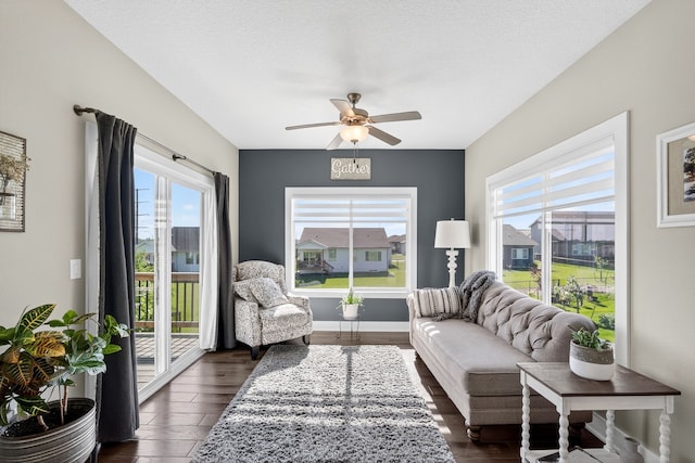 5519 165th St, Urbandale, IA 50323 - living area with dark wood finished floors and a ceiling fan
