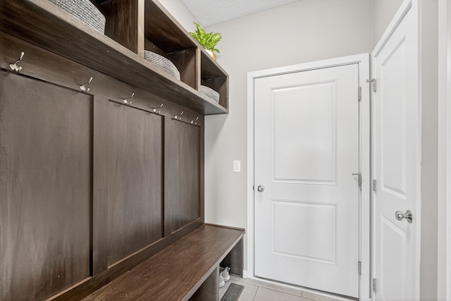 5519 165th St, Urbandale, IA 50323 - mudroom featuring light tile patterned floors