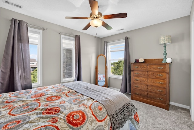 5519 165th St, Urbandale, IA 50323 - bedroom featuring carpet flooring and a ceiling fan