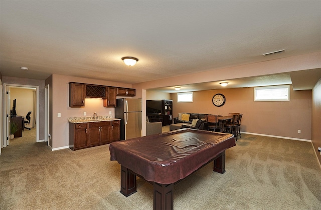 358 S 85th St, West Des Moines, IA 50266 - playroom with wet bar, light colored carpet, pool table, and healthy amount of natural light