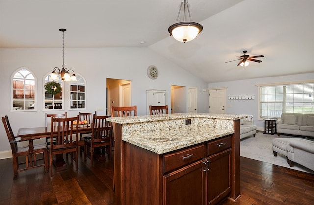 358 S 85th St, West Des Moines, IA 50266 - kitchen featuring open floor plan, lofted ceiling, dark wood finished floors, ceiling fan, and hanging light fixtures
