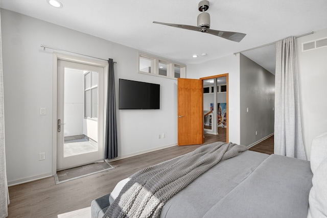 640 S 50th St Unit 2204, West Des Moines, IA 50265 - bedroom with wood finished floors, recessed lighting, and a ceiling fan