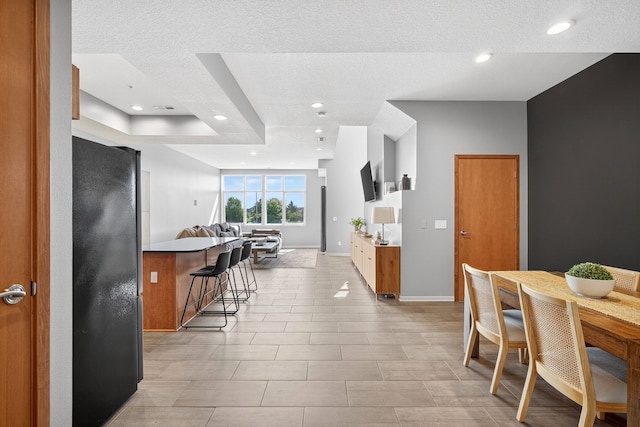 640 S 50th St Unit 2204, West Des Moines, IA 50265 - dining space featuring recessed lighting and a textured ceiling